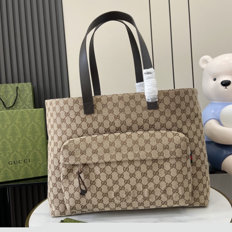 G*u*i shopping bags